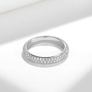 Detailed macro shot of an elegant S925 sterling silver moissanite eternity band.