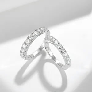 Macro view of S925 silver eternity band rings with 3mm moissanite stones