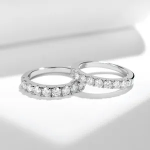 Detailed close-up of a sparkling 3.0mm moissanite half eternity ring in S925 silver