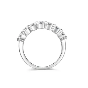 Elegant S925 silver eternity ring with 3.5mm round moissanite stones on white background.