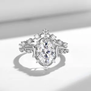 Close-up of oval moissanite star and moon ring set in S925 sterling silver band