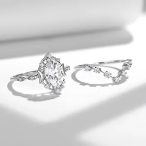 Detail view of oval cut moissanite ring set with star and moon accents in S925 silver
