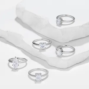 Vista detallada de anillos de compromiso de moissanita de 1 quilate en varias formas