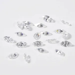 Marquise cut lab-grown diamonds loose stones scattered on white surface