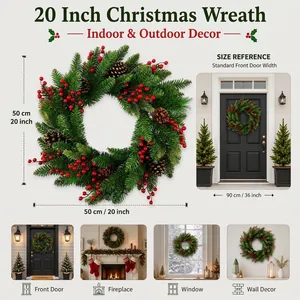 Detail view of 20-inch Christmas wreath with pine needles, cones and berries for home decor