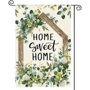 Detailansicht einer Gartenfahne mit Aquarellblumen und 'Home Sweet Home' Aufdruck