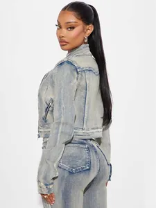 Elegant woman wearing high-stretch washed light blue denim jacket and matching jeans set