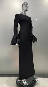 Elegant black slim-fit maxi dress with flared sleeves and crystal-embellished collar.