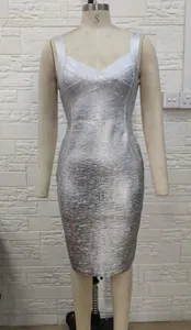 Detail view of silver metallic bandage dress on mannequin highlighting texture