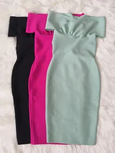 Detail view of off-the-shoulder bandage dresses in black, vibrant pink and sage green.