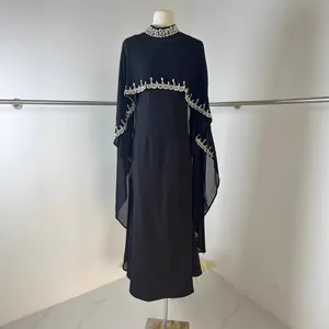 Elegant black long dress with a sparkling rhinestone cape set for formal evening wear.