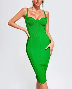 Vibrant green bodycon bandage dress with corset-style neckline for a sexy evening look.