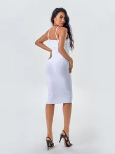 Rear view of an elegant white bodycon midi dress on a professional model