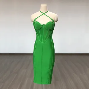 Full view of green bandage dress on mannequin showing the halter neck and corset design.