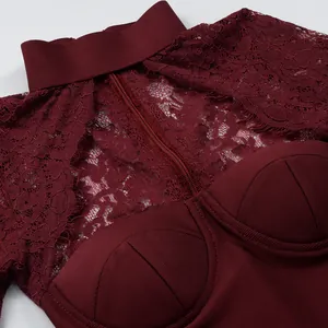 Elegant detailed close-up of a burgundy lace bandage dress with high neck and bustier cups