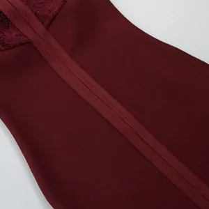 Detail view of burgundy bandage dress showing high-quality fabric and intricate lace design.