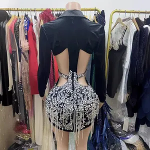 Luxurious black long sleeve backless blazer dress with intricate rhinestone fringe detail