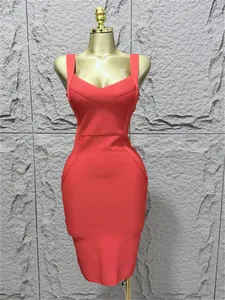 Detailed view of the red bodycon bandage dress featuring a sexy low-cut neckline.