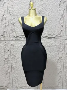 Close-up of black sleeveless bodycon bandage dress with crossover low-cut neckline