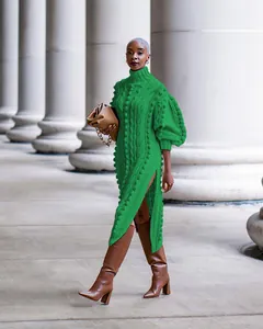 Stylish green high-neck cable-knit dress with side slit and puff sleeves