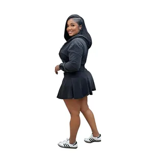 Side view of women's casual washed black denim hooded jacket and mini skirt set
