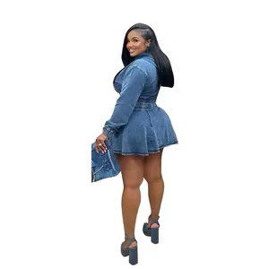 Detailed side view of a stylish women's washed blue denim jacket and mini skirt set
