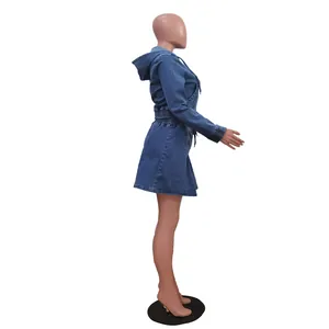 Side view of a casual washed denim hooded top and mini skirt two-piece set for women