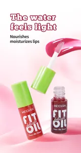 Detailed macro view of MEIDIAN mirror finish lip oil with delicate cream-like texture.