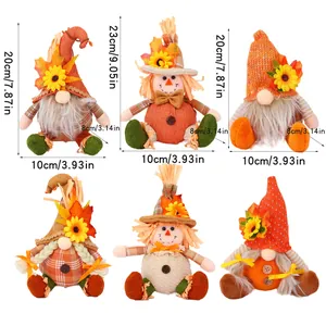 Dimensional detail of Thanksgiving gnomes with harvest sunflowers and maple leaves