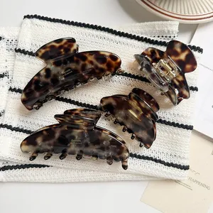 Lot de quatre pinces à cheveux en acétate écaille de tortue pour coiffure élégante femme