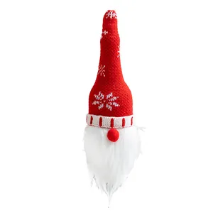 Feestelijke gebreide kerstkabouter wijnfleshoes met rode muts en een witte baard