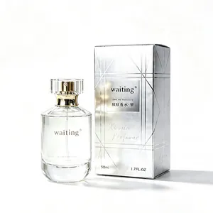 Coffret de parfum professionnel en verre transparent 50 ml avec boîte cadeau argentée élégante