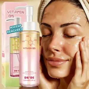 Close-up of DK'DE Vitamin B5 makeup remover oil applied to model's face