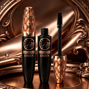 Primo piano del mascara BMBN 36H e scovolino con cappuccio geometrico in bronzo