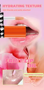 Detail view of hydrating fruit lip oil showing the jelly-like transparent texture