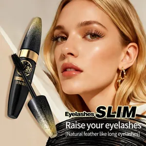 Detailed view of BMBN mascara brush showing natural feather-like eyelash length.