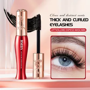 Detail view of BMBN mascara wand and thick curled eyelash effect on blue eye