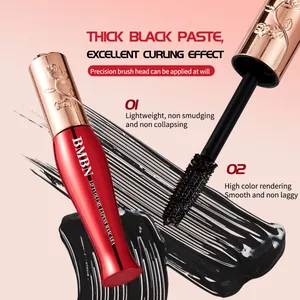 Detailed view of the BMBN mascara brush head and thick black curling paste texture