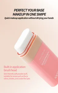 Close-up of built-in soft powder puff head on pink moisturizing concealer stick.