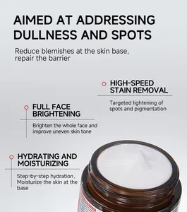 Primer plano de la crema blanca que muestra las funciones de iluminación y eliminación de manchas.