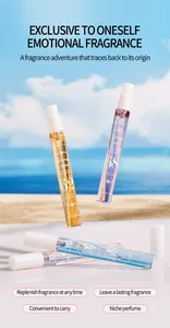 Flaconi spray da 10ml di profumo digitale Tao Beauty su uno sfondo di spiaggia soleggiata.