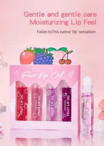 Close-up van de MEIDIAN fruit-lipolieset met vier kleurrijke rollerflesjes in doos.