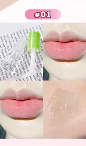 Detailed view of clear mirror finish lip gloss application and swatch texture shade 01