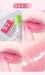 Close-up detail of MEIDIAN mirror lip gloss shade #02 showing shiny cream-like texture