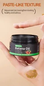 Vue détaillée de la crème bouclante MEIDIAN Batana Oil montrant sa texture épaisse de pâte