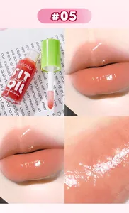 Glossy mirror finish lip oil in coral shade 05 for hydrated healthy lips effect