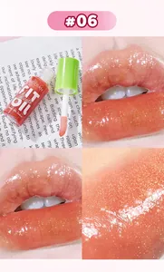 Close-up of MEIDIAN shimmering orange lip gloss shade 06 with moisturizing glossy finish