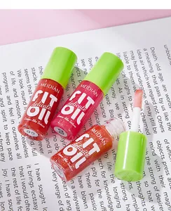 Detailed view of MEIDIAN lip gloss tubes showing cream-like texture and vibrant colors.