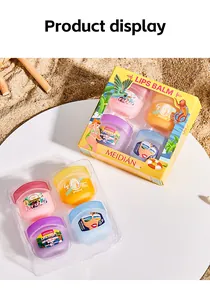 Macro view of MEIDIAN 4-piece moisturizing lip balm set on a sunny beach background