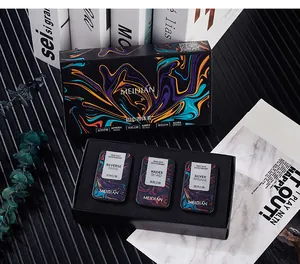 Detailed view of MEIDIAN 3-piece solid perfume set featuring portable metal balms